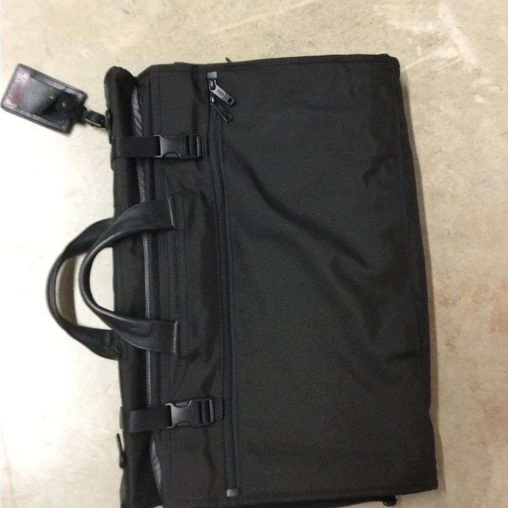 Tumi Black Men's Travel Duffel with Front Zip Pocket and Carry Handles